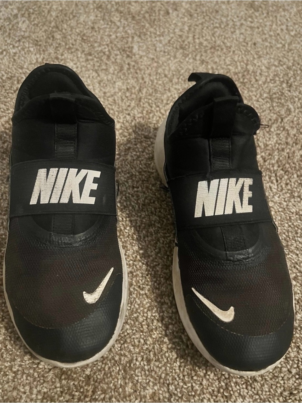 Nike Black and White Slip-On Sneakers